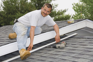 Man Performing Roof Repairs